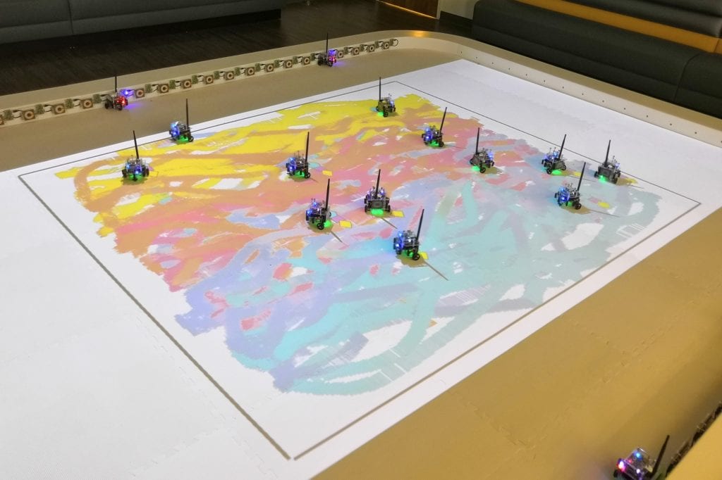 Robot swarms follow instructions to create art
