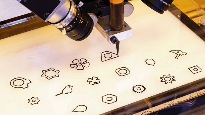 Using reinforcement learning for control of direct ink writing